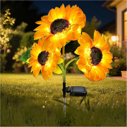 Solar sunflower garden light with three illuminated flower heads