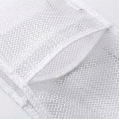 Close-up of laminated mesh toiletry pouch material