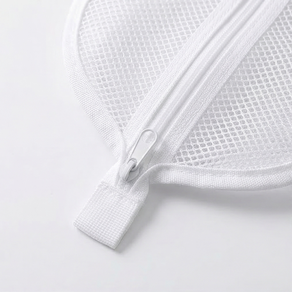 Close-up of travel pouch zipper and hanging loop