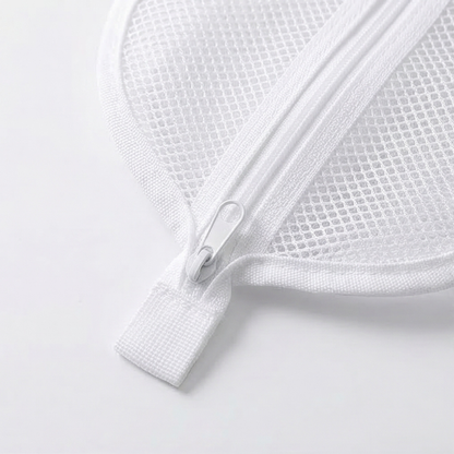 Close-up of travel pouch zipper and hanging loop