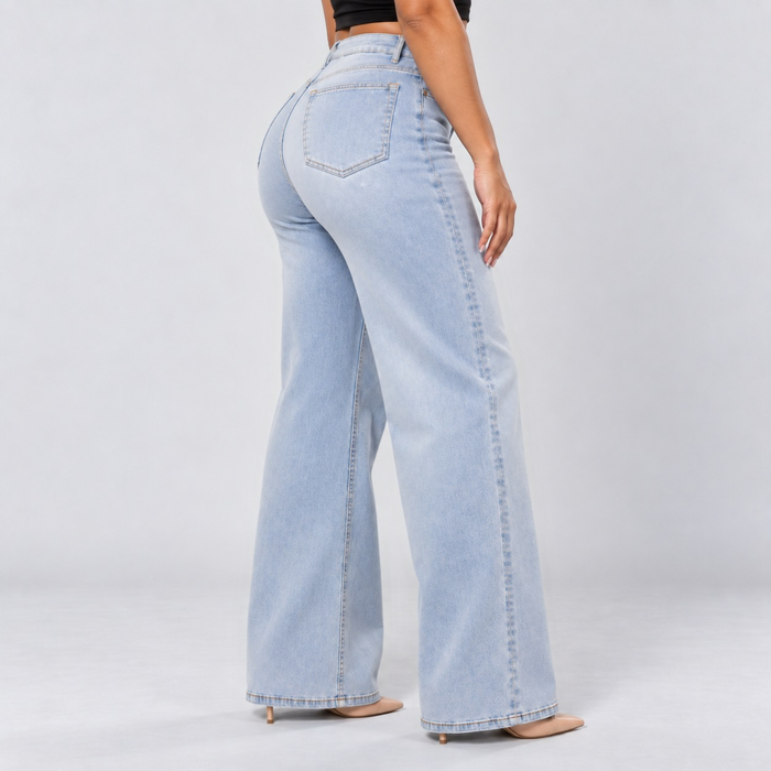 Light blue jeans from a rear side angle showing the relaxed wide-leg shape